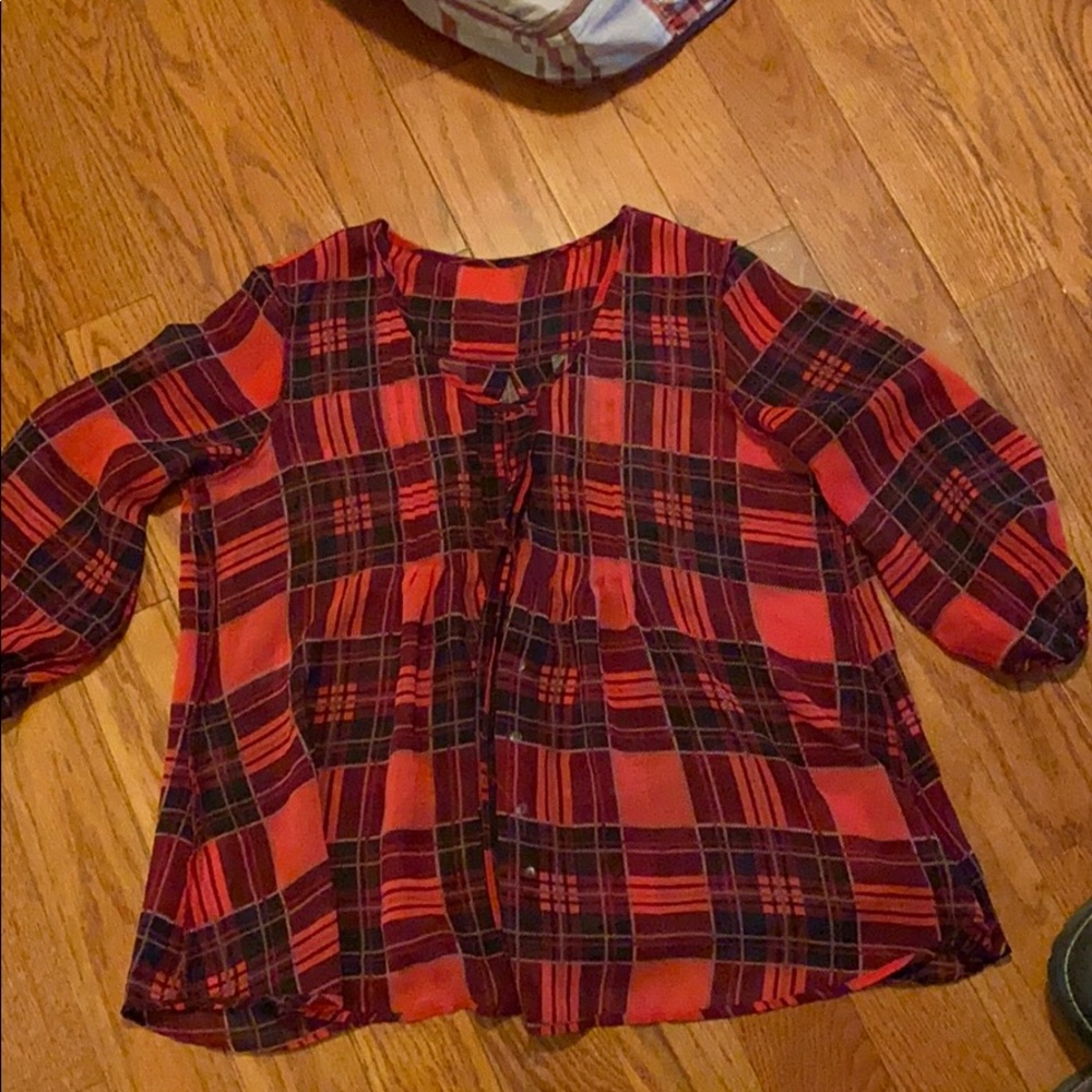 A see through loose flannel.